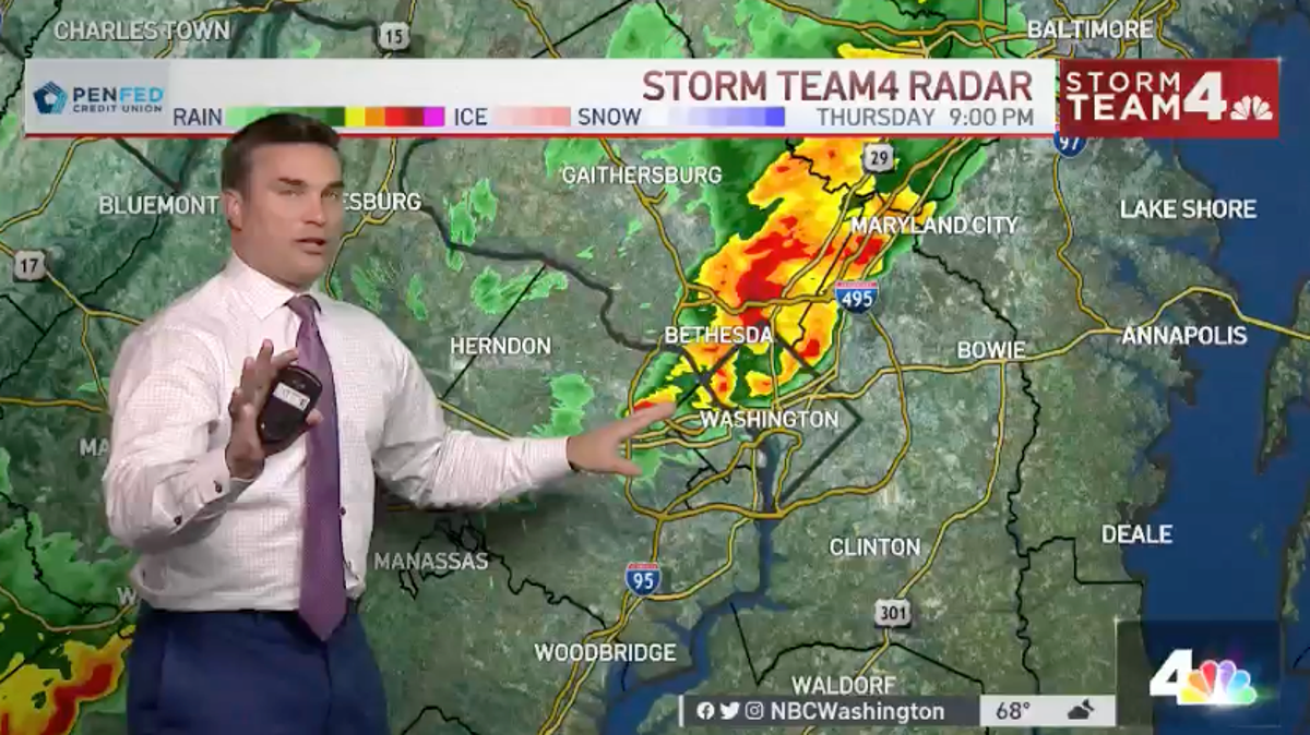 Doug Kammerer Meteorologist pauses live weather report to call family